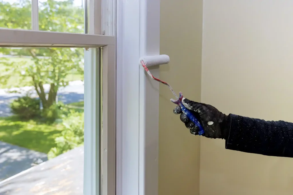 Painter in Epping preparing surface with price estimate in hand – Hawthorn Painting
